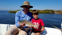 Dylan and Grandfather with Redfish catch - 20151011_112705